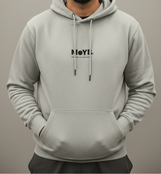 Man wearing a gray hoodie with MoYB text on a plain background